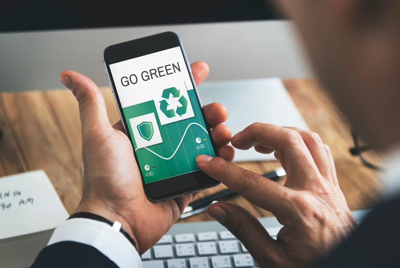 enablegreen-green-technology-jobs-go-man-holding-phone-with-gogreen-app